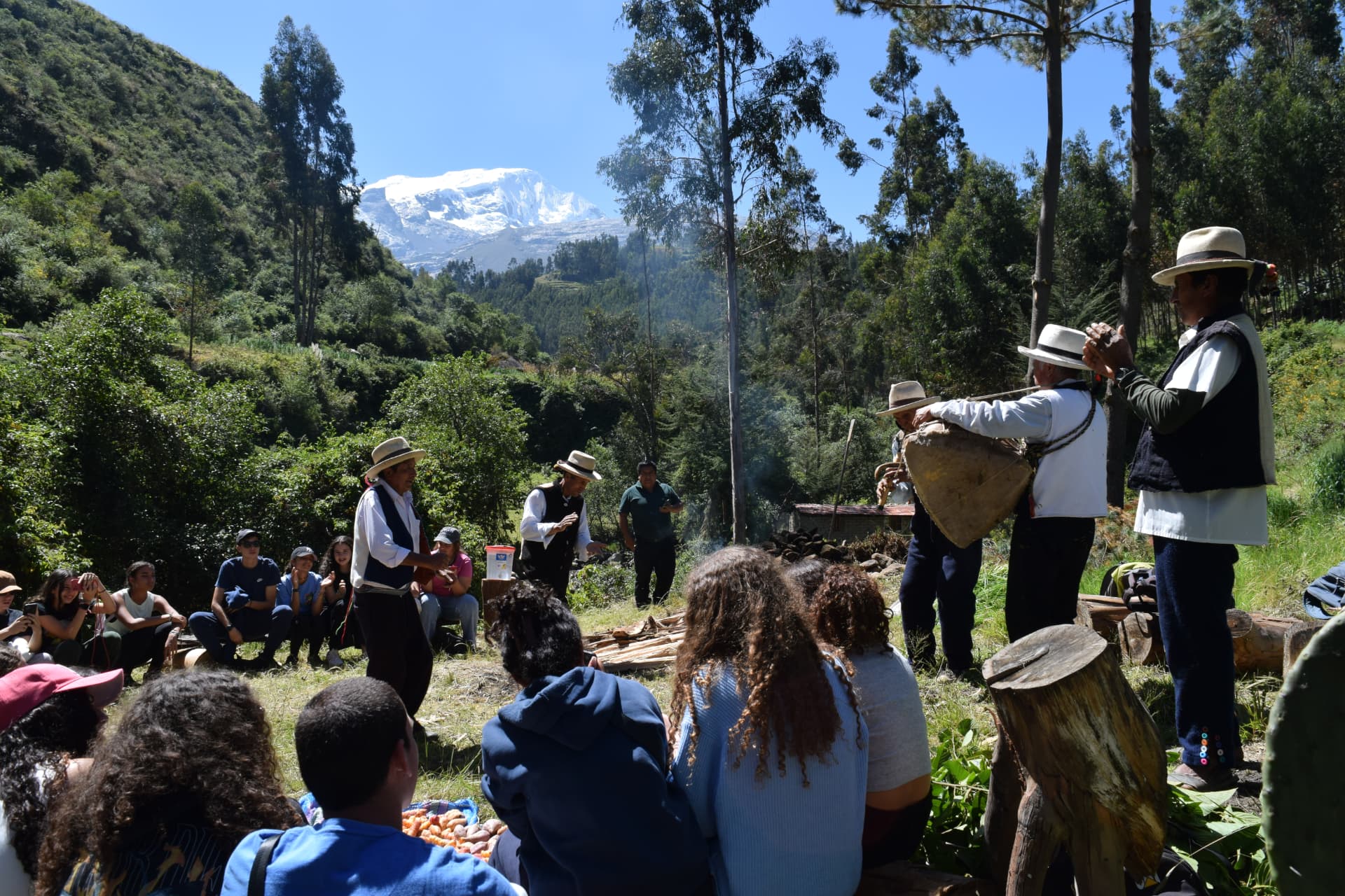 Community planting day with the Huascarán in the background